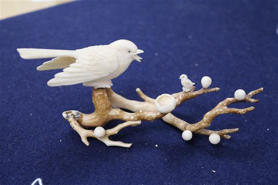 A carved ivory animal group